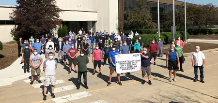 Windsor plant workers standing outside plant